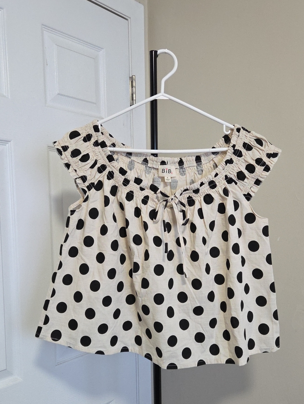 BiBi Cream Top with Black Polka Dots and Smocked Neck